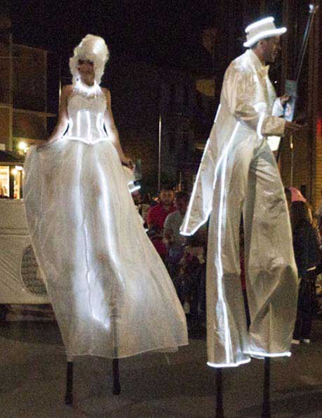 Itinerant parade street theatre white